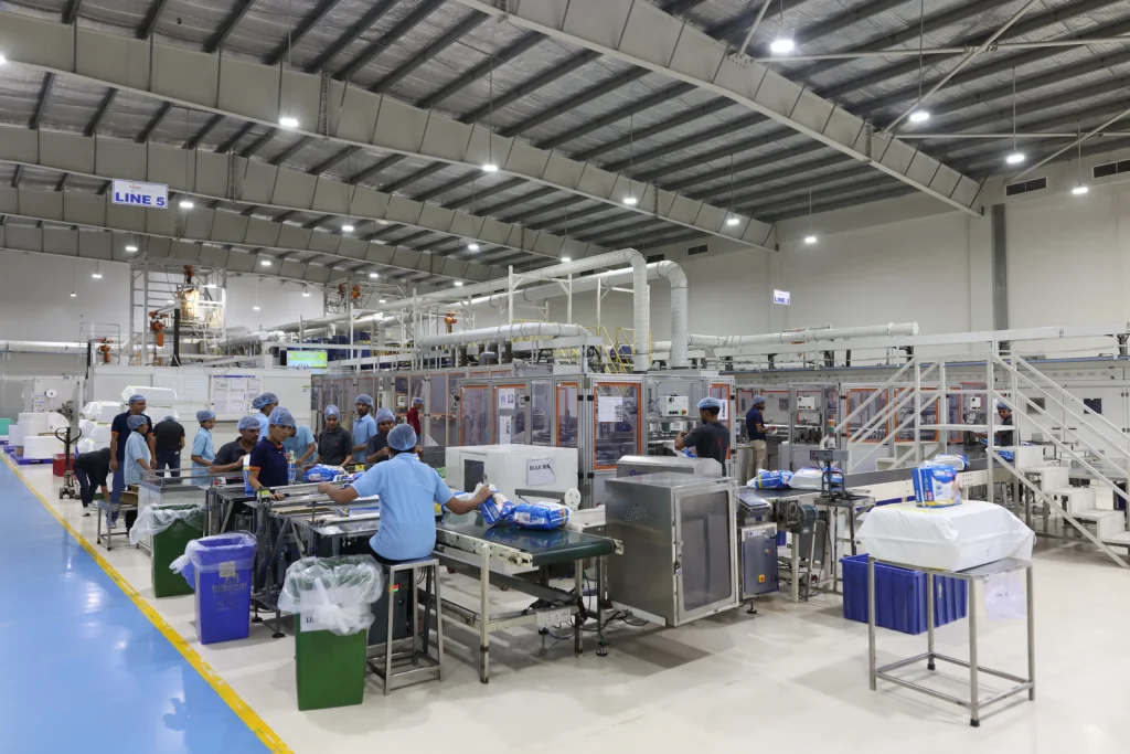 Operators working in the Swara Baby Group packing hall