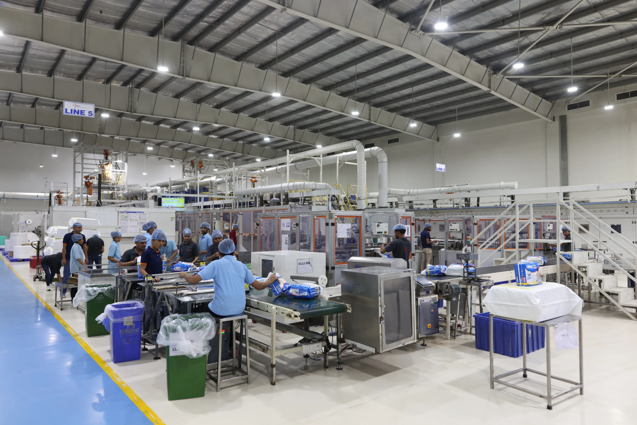Operators working in the Swara Baby Group packing hall