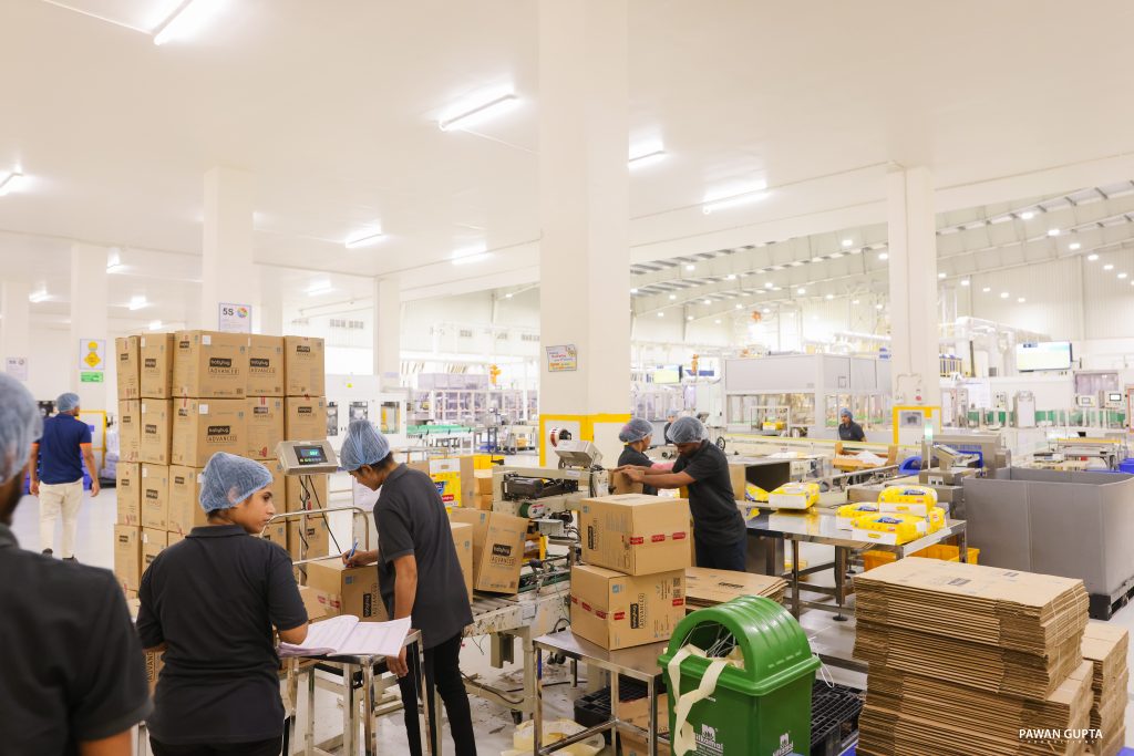 Staff packing finished cartons in the Swara Baby Group warehouse