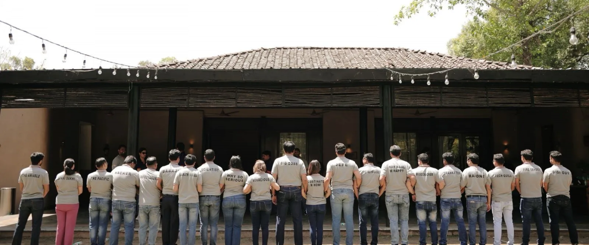 Swara Baby Group employees lined up outside the plant building